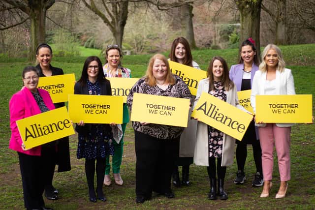 Alliance Party leader Naomi Long with her party's female election candidates at a launch event in Belfast.