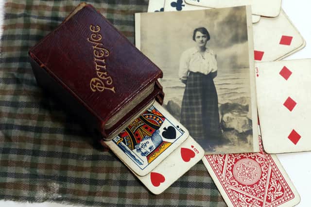 A deck of Patience cards, a chequered handkerchief and a postcard, which all belonged to British lawyer, suffragette, political activist and Titanic survivor, Elise Bowerman, one of the lots for sale in the Bloomfield Auctions Titanic sale on Tuesday, April 26.