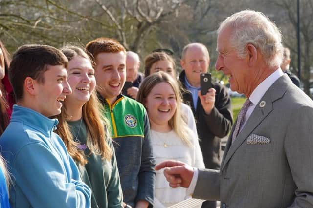 Prince Charles shares a joke with Lee Usher and other Loughry students during a visit to the campus on March 22. Lee was struck by a lorry and killed close to Loughry on April 6. Photo: Aaron McCracken