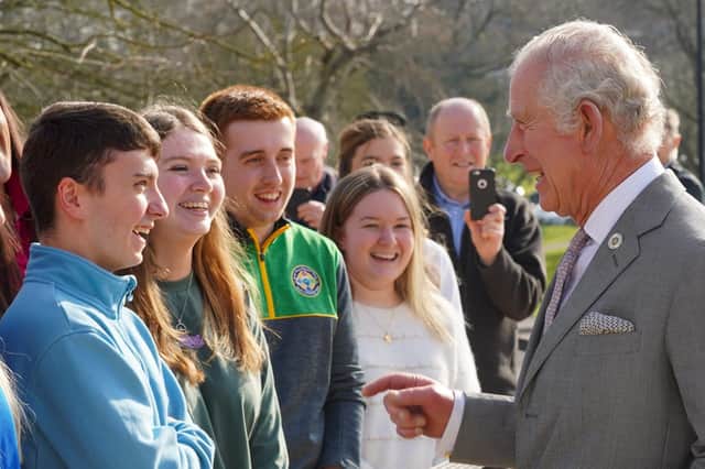 Lee Usher (in blue top) sharing a joke with Prince Charles during a royal visit to Loughry College last month. Photo: Aaron McCracken