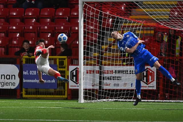 Lee Bonis wraps up the Larne scoring in last night’s 3-0 win over Coleraine with an acrobatic finish. Pic by Pacemaker.