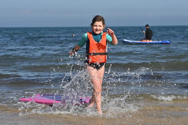 Grace Curran enjoys the glorious spring weather at Helen’s Bay on Sunday, March 27