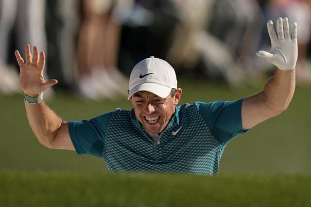 Northern Ireland's Rory McIlroy reacts after holing out from the bunker for a birdie during the final round at the Masters golf tournament in Augusta. He finished runner-up to America's Scottie Scheffler. Pic by PA.