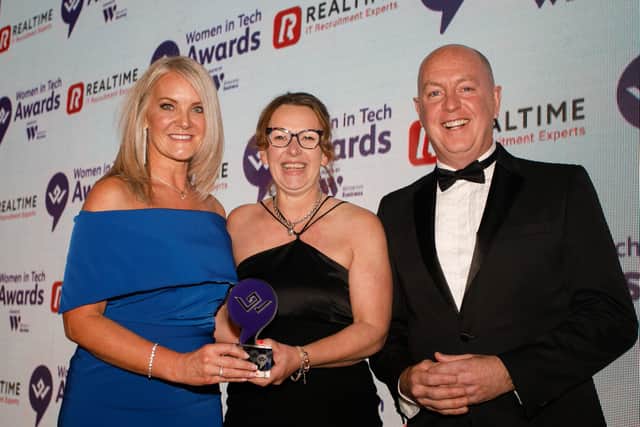 Melanie McMordie and Janet Burns, both BT collect Tech Team of the Year award. They are pictured with Declan McNiff, Realtime, sponsors of the award