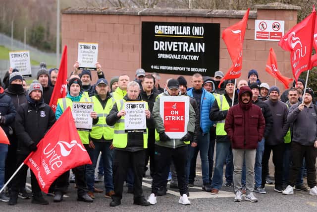 Caterpillar employees and Unite union members form a picket at the company's west Belfast plant.  

Members are also striking at the Larne plant. 

Picture: Jonathan Porter/PressEye