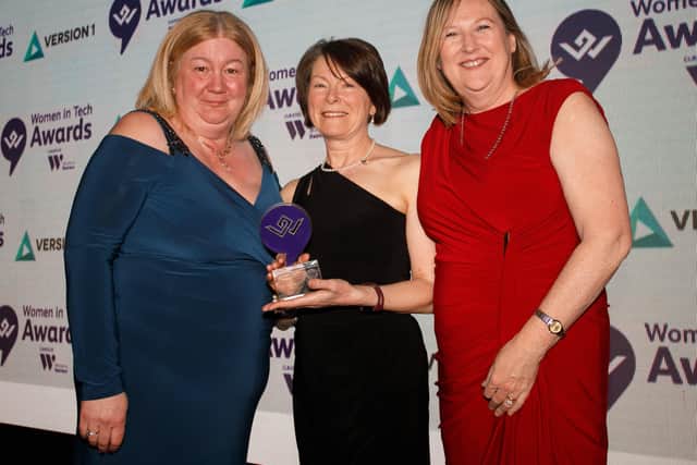 Patricia O'Hagan MBE collects the Outstanding Woman in Tech 2022 award. She is pictured with Lorna McAdoo, Version 1 and Roseann Kelly MBE (right), CEO of Women in Business