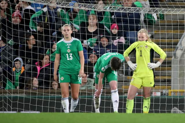 Northern Ireland players dejected as England recorded a convincing win in Belfast