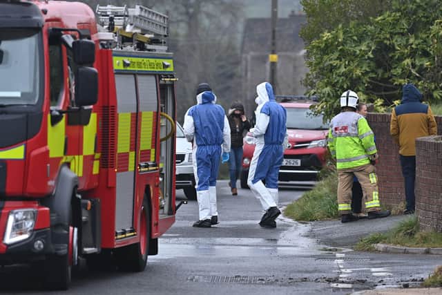 Police and NIFRS at the scene of a fire on the Manse Road in Carryduff on Tuesday.