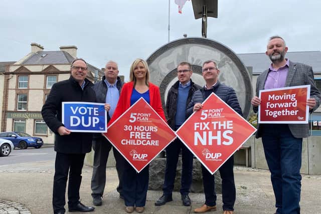 Diane Forsythe on the campaign trail yesterday with former MP Nigel Dodds (left), DUP leader Sir Jeffrey Donaldson (second right) and party supporters