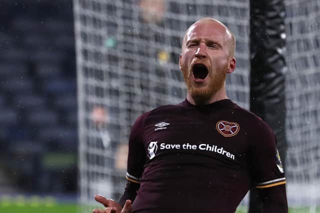 Liam Boyce struck an extra-time penalty as Hearts defeated Hibernian 2-1 in a last-four clash played behind closed doors in October 2020 due to Covid-19 restrictions.