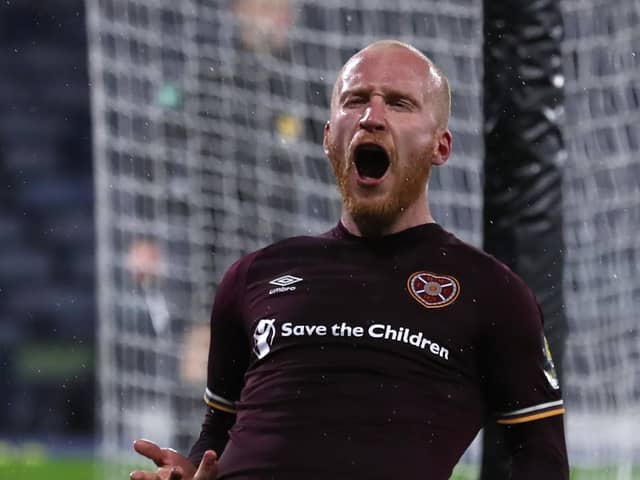 Liam Boyce struck an extra-time penalty as Hearts defeated Hibernian 2-1 in a last-four clash played behind closed doors in October 2020 due to Covid-19 restrictions.
