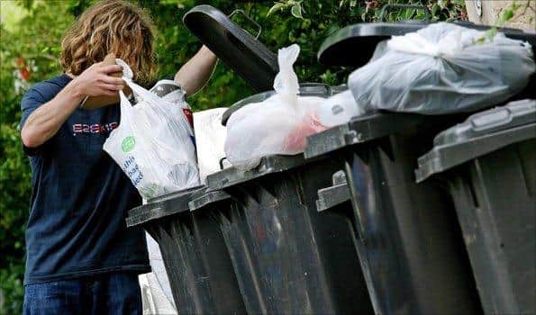Edwin Poots has raised fears of bin bags full of rubbish stacking up outside people’s houses, if bins go uncollected