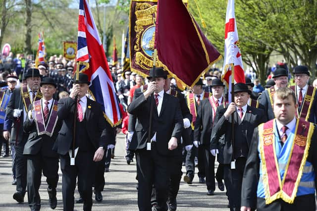 Pacemaker Press 18-04-2022:  Easter Monday parade that started in Woodpile Park at the top of the Shankill Road in Belfast.Picture By: Arthur Allison/Pacemaker Press.