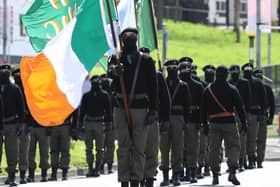 Saoradh colour party marches from Free Derry corner to the City Cemetery in Londonderry, as part of an event to mark the 1916 Easter Rising. Picture date: Monday April 18, 2022.