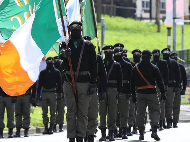 Saoradh colour party marches from Free Derry corner to the City Cemetery in Londonderry, as part of an event to mark the 1916 Easter Rising. Picture date: Monday April 18, 2022.