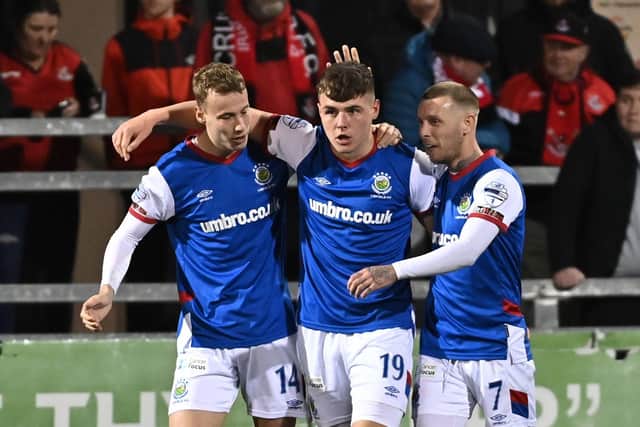Linfield’s Ethan Devine celebrates after his winning goal for the Blues at Crusaders