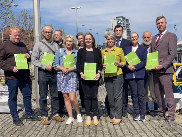 Green Party election candidates attend the party's manifesto launch for the Assembly election at the Belfast Barge attraction on the river Lagan on Thursday
