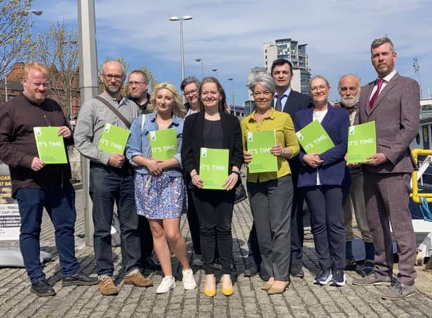 Green Party election candidates attend the party's manifesto launch for the Assembly election at the Belfast Barge attraction on the river Lagan on Thursday
