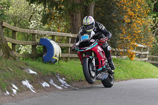 Adam McLean claimed pole for the Supersport and Supertwin races at the Cookstown 100 on Friday.