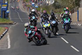 Adam McLean leads Mike Browne (16) into Gortin corner at the start of the Supersport race at the Cookstown 100 on Saturday.