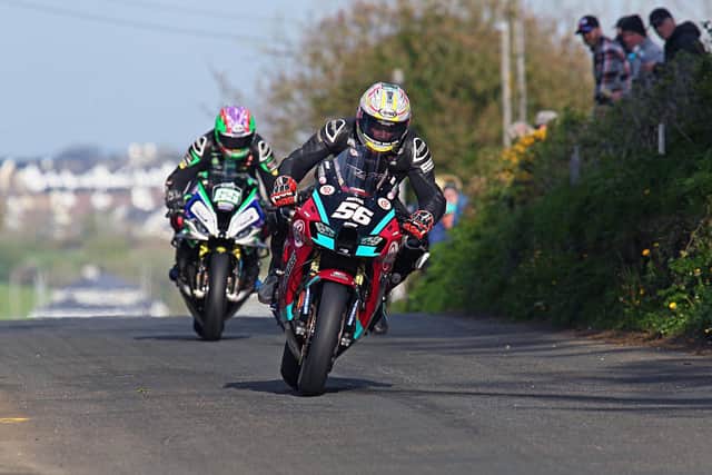 Adam McLean (McAdoo Kawasaki) leads eventual winner Michael Sweeney (MJR BMW) in the first Superbike race at the Cookstown 100.