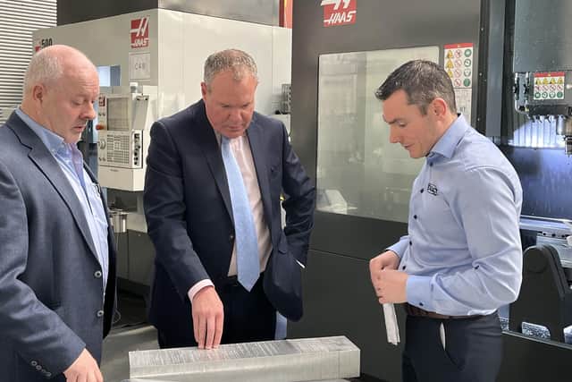 Pictured during a recent visit to Newry based Engineering firm, the Exact Group, is Minister of State, Conor Burns MP alongside managing director of the firm, Stephen Cromie and general manager, Ronan Callan