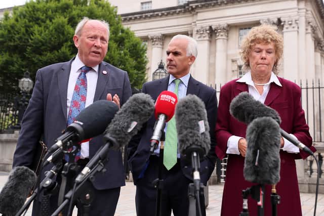TUV leader Jim Allister, Baroness Hoey and former MEP Ben Habib outside the High Court in Belfast after an earlier hearing last year.