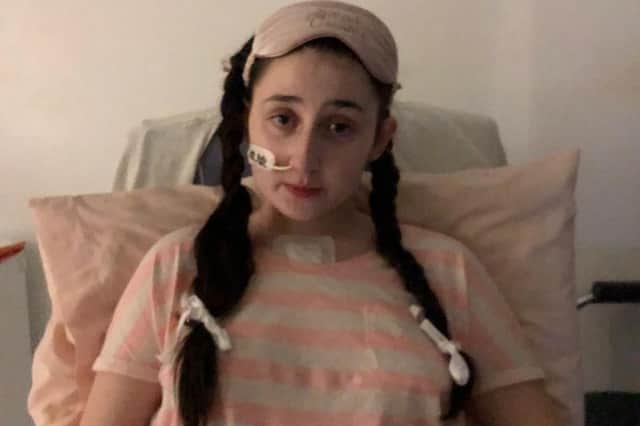 Nicole Hamilton in hospital last March with a rare life-threatening illness