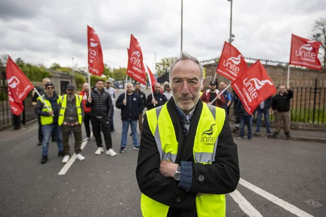 Kieran Molloy, Shop Stewart for UNITE Union, standing with colleagues and members on strike at Ormeau Road Recycling Centre in Belfast. Picture: Liam McBurney/PA Wire