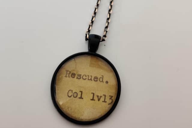 A necklace from Melanie Bond's Wearable Truth collection