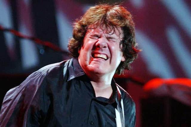 Gary Moore performing onstage in 1994. Photo: Ian West/PA Wire