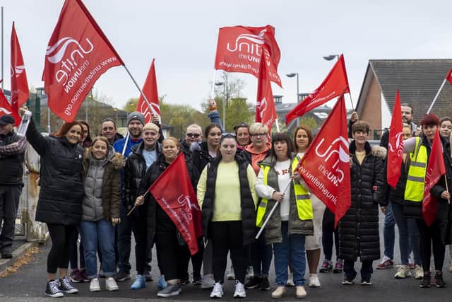 Marie Spence (seventh from right), representative for UNITE Union in the Education Authority, standing with members on strike at Glenveagh School, Belfast.