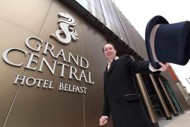 Jonathan Wade, the Head Concierge at Belfast's Grand Central Hotel, welcomes visitors to the hotel. 
PICTURE BY STEPHEN DAVISON