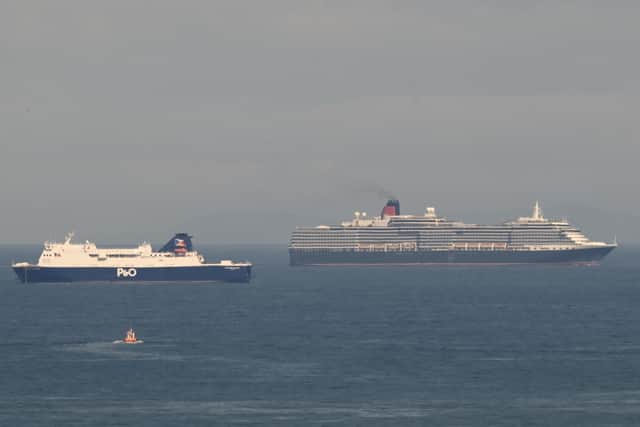 The Queen Victoria with the P&O vessel European Causeway in the foreground at Larne on Tuesday. Image submitted by reader Steven Williamson