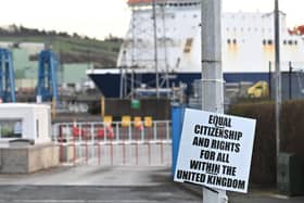 A sign at Larne port, one of countless anti-Protocol placards and pieces of graffiti which have appeared over the last year across Northern Ireland