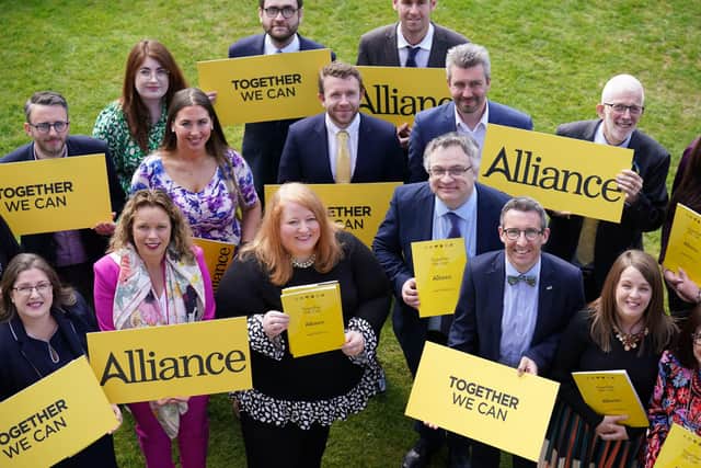 Alliance Party leader Naomi Long with some of her party's candidates at the launch of the Alliance Party Assembly 2022 election manifesto at CIYMS in Belfast. Picture: Niall Carson/PA Wire