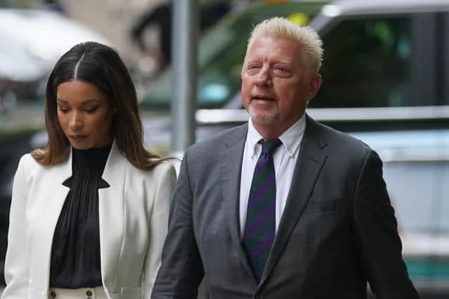 Three-time Wimbledon champion Boris Becker, arrives alongside partner Lilian de Carvalho Monteiro, for sentencing at Southwark Crown Court, in London.
