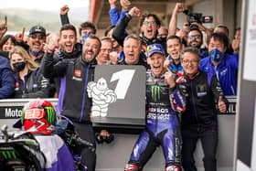 Monster Energy Yamaha's Fabio Quartararo celebrates victory in the Portuguese MotoGP race.