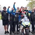 Dominic Herbertson celebrates his Supersport win at the Tandragee 100 on Saturday with the Burrows Engineering/RK Racing team.