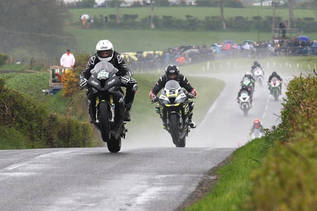 Michael Sweeney (MJR BMW) leads Thomas Maxwell (Kawasaki) on the first lap of the Open Superbike race at the Tandragee 100 on Saturday, which was red-flagged on the second lap.
