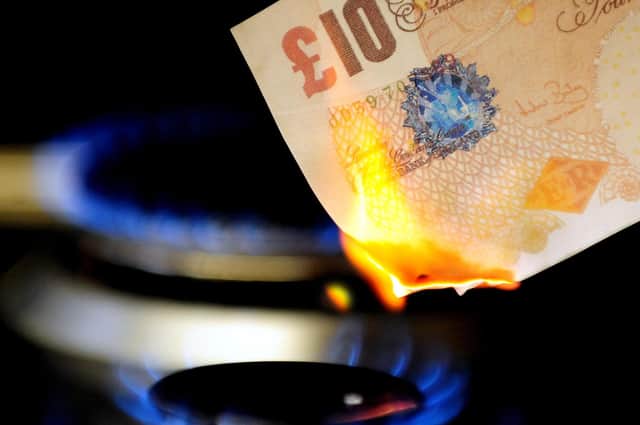 File photo dated 22/04/12 of a £10 note burning on a gas hob. Energy bill rises and increases in fuel costs are expected to push the latest inflation figure to 2.8% today, well above the Government's 2% target. PRESS ASSOCIATION Photo. Issue date: Tuesday March 19, 2013. The upward movement in the Consumer Prices Index (CPI) measure of inflation for February follows a four-month run when it has remained at 2.7%. See PA story ECONOMY Inflation. Photo credit should read: Rui Vieira/PA Wire