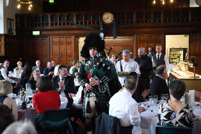 Pipe Major Matthew Wilson pipes in the haggis during the Friends of the Campbell College Pipe Band, Burns Night Supper. Picture: Michael Cooper