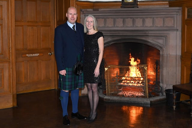 Chairman of the Friends of the Campbell College Pipe Band, Michael Cooper with his wife Sara during the Friends of the Campbell College Pipe Band, Burns Night Supper.