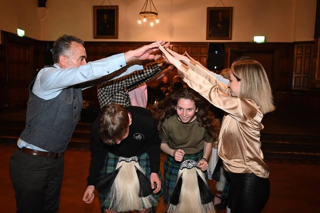 Guests enjoy the Ceilidh band Risinâ€TM Stour during the Friends of the Campbell College Pipe Band, Burns Night Supper. Picture: Michael Cooper