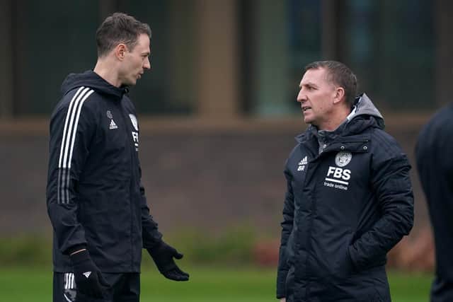 Leicester City manager Brendan Rodgers (right) with Jonny Evans