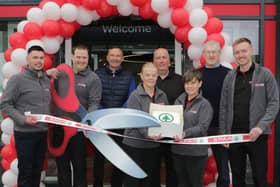 Owners Richard and Crawford Henderson, with store manager David Bucklee, assistant manager Harry Walsh and senior sales assistants from the store