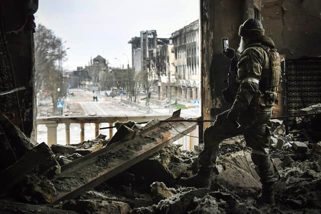 Kyiv was expected to become a version of Stalingrad. Instead, that horror has been visited on Mariupol, above (in this image a Russian soldier is seen at the city's damaged drama theatre)