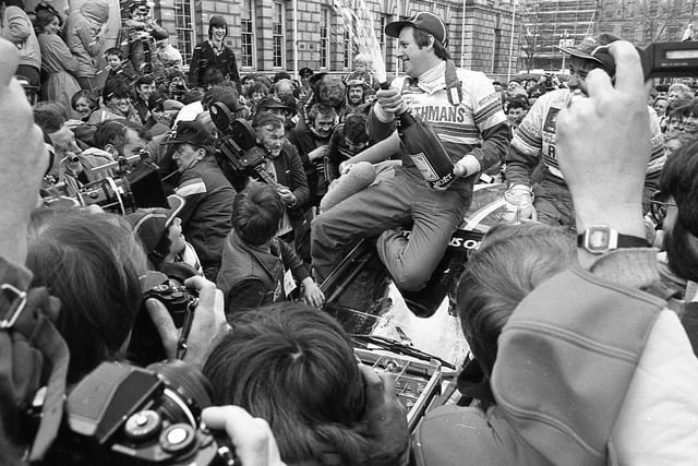 Circuit of Ireland winner Scotsman Jimmy McRae opens the traditional bottle of champagne after crossing the finishing line at Belfast City Hall in April 1982. Picture: News Letter archives