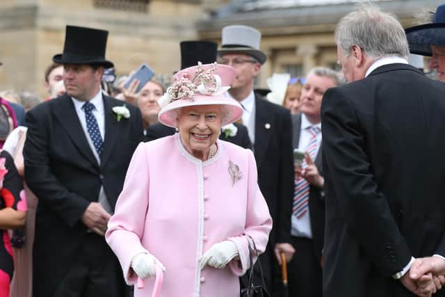 Queen Elizabeth II during a previous Royal Garden Party at Buckingham Palace in London
