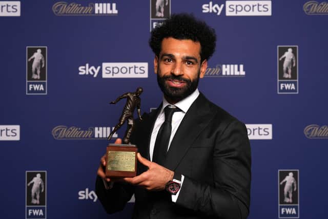 Liverpool's Mohamed Salah poses with the FWA Player of the Year Award during the FWA Footballer of the Year dinner held at the Landmark Hotel, London.